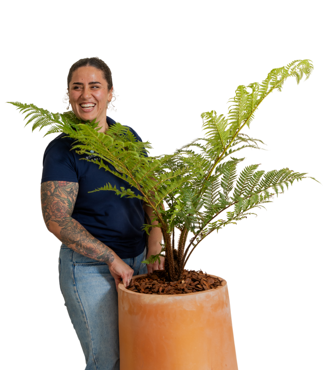 Advance Plants team member with a fern