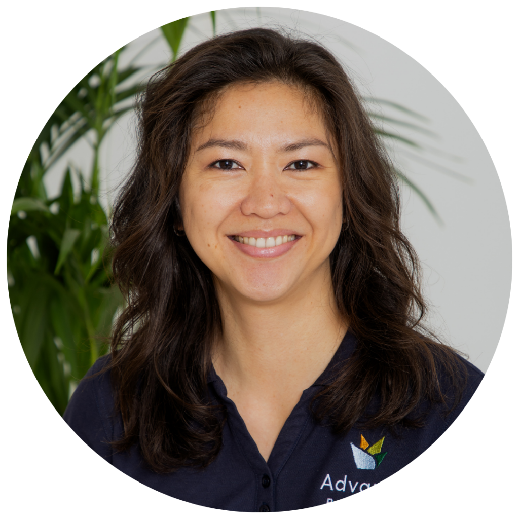 Headshot of Dane Rose Marcial, designer at Advance Plants, in branded navy polo