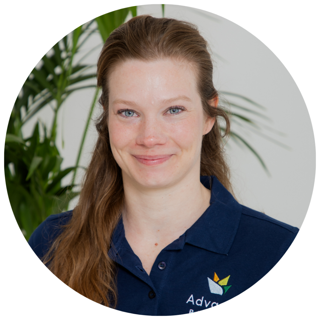 Headshot of Jaleesa Mallee, designer at Advance Plants, in branded navy polo
